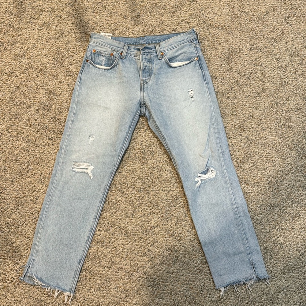 Light wash Levi’s 501 jeans